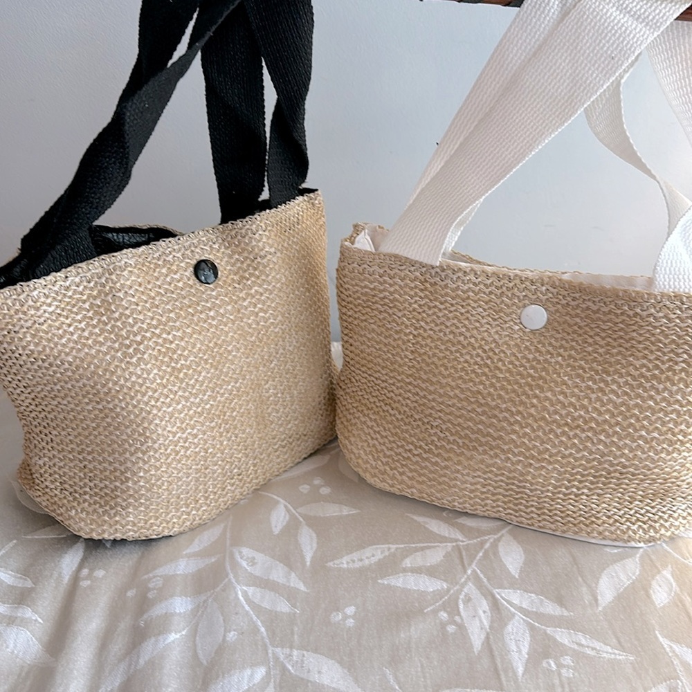 Adorable mini straw bag. Snap closure and black handle. See description.